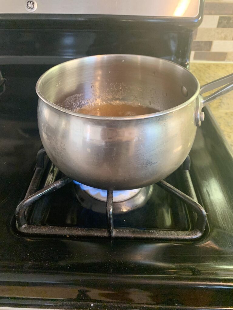 heating-pot-of-gelatin-on-stove